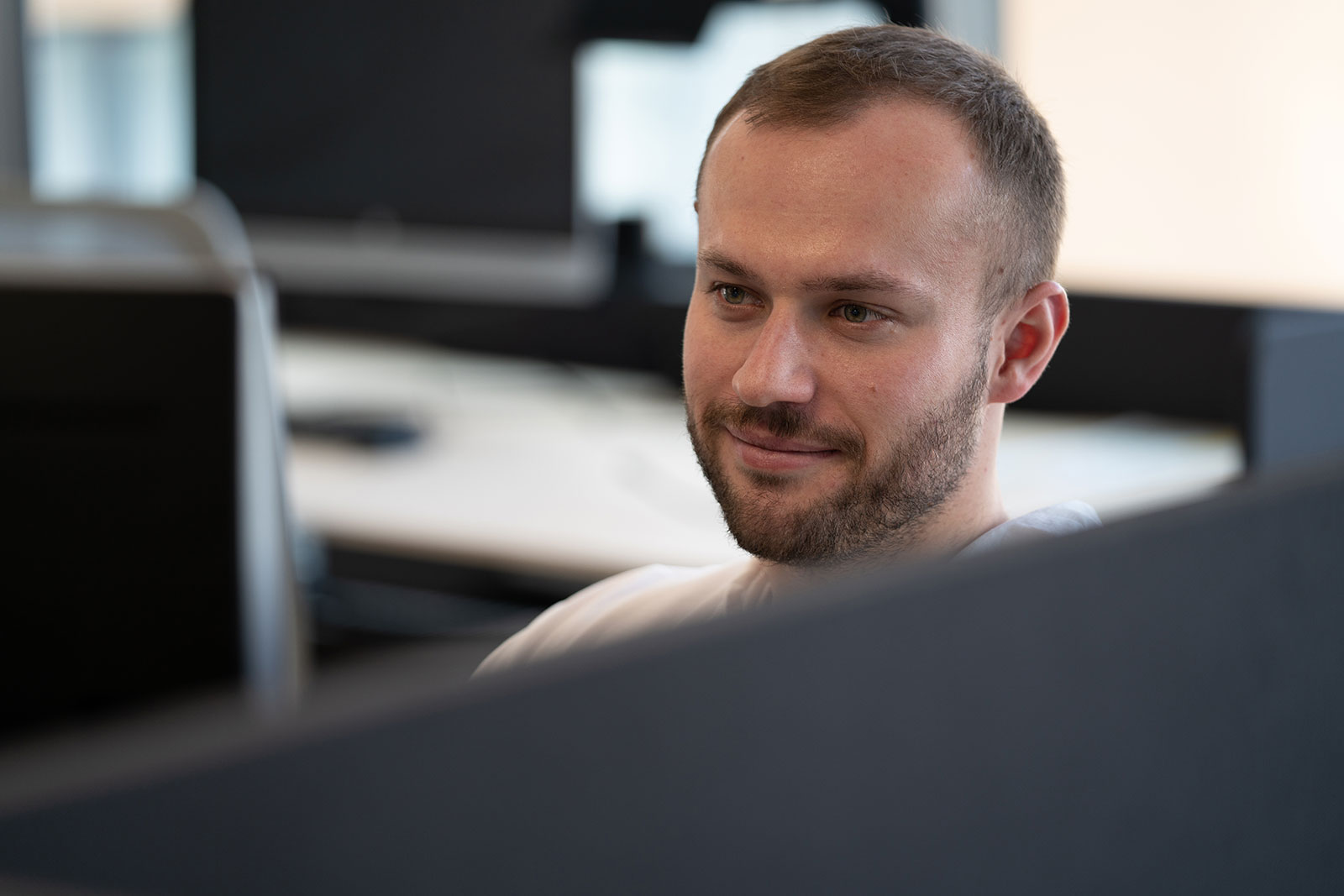 Male using desktop computer