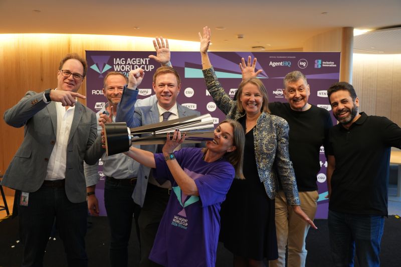 Image of Agent World Cup winners and tech team celebrating in office