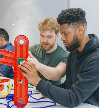 Group of people working through a team building exercise