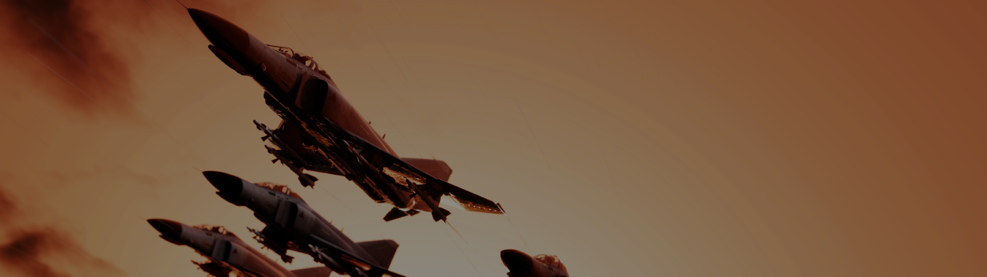 Multiple military fighter jets flying in formation against a dramatic orange sky, representing advanced aerospace engineering, precision systems, and defense technology.