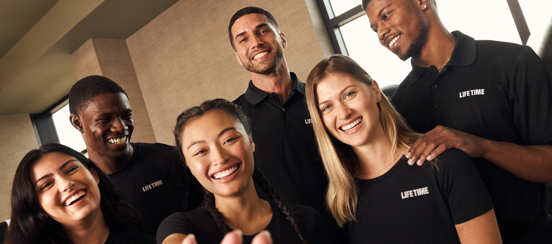 A happy group of Life Time team members.