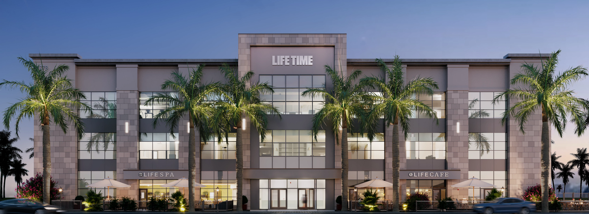 Front entrance to Life Time Miami at the Falls surrounded by palm trees.