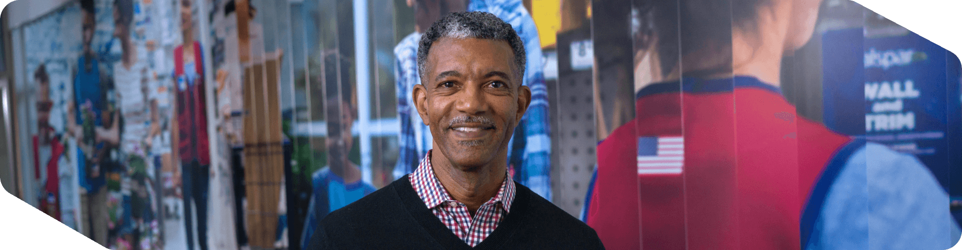 Lowe's associate standing in an open workspace at Corporate Headquarters