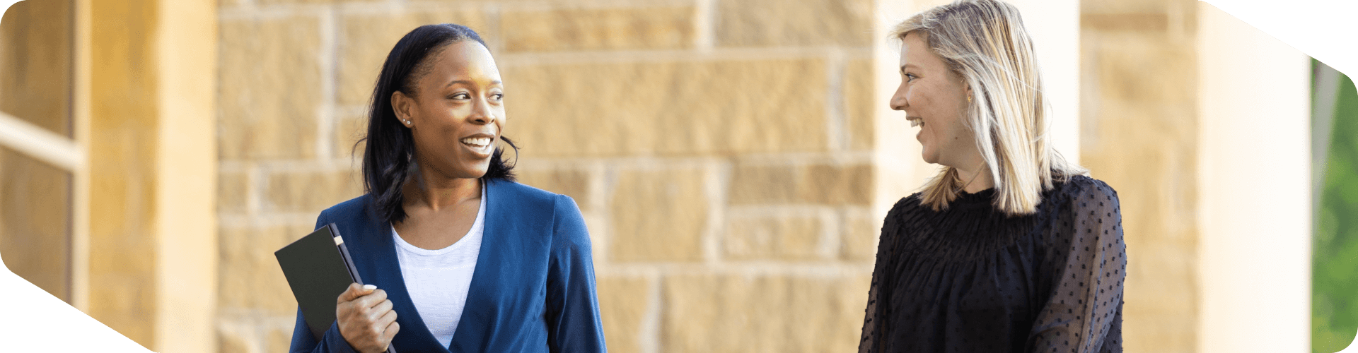 Lowe's associates walking outside at corporate headquarters