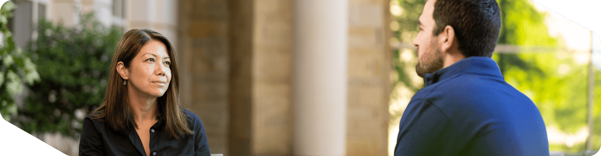 Associates meeting outside at corporate headquarters