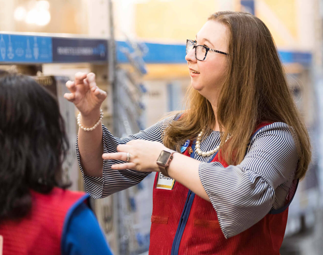 Lowe's associates using sign language to communicate