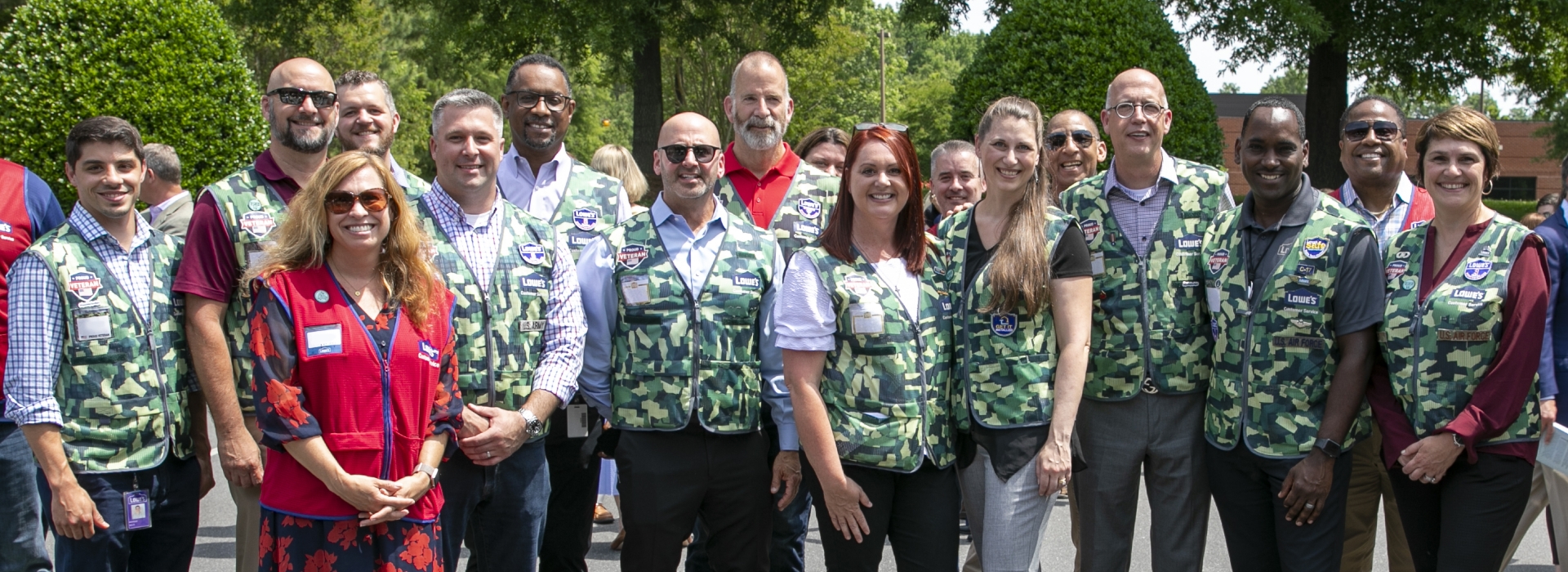 Lowe's leaders and associates attending a military event