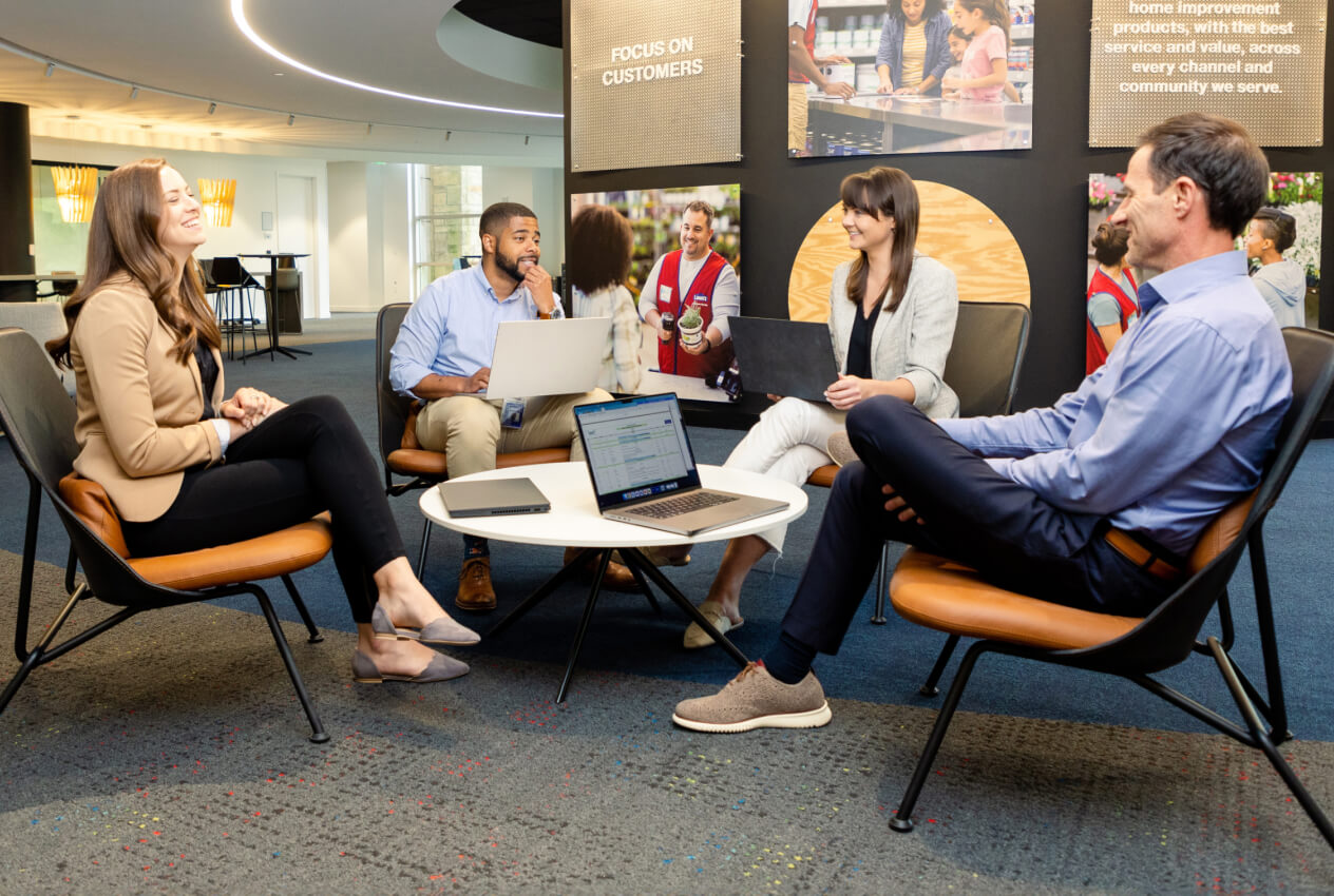 Lowe's associates having a meeting