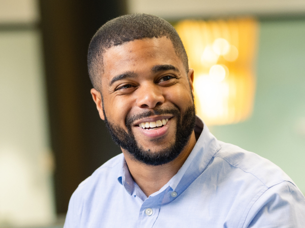 Corporate associate smiling