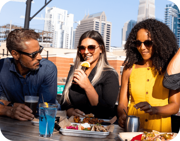 Friends enjoying dinner in Charlotte