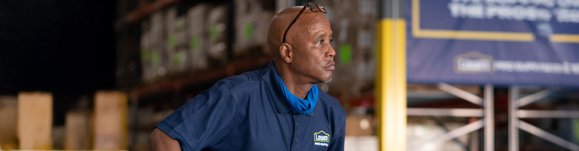 Lowe's Pro Supply associate working in a warehouse