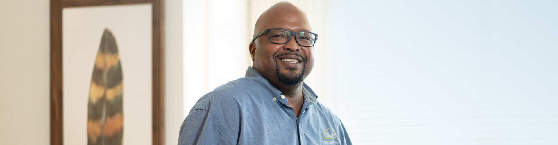 Lowe's Pro Supply associate working in-home