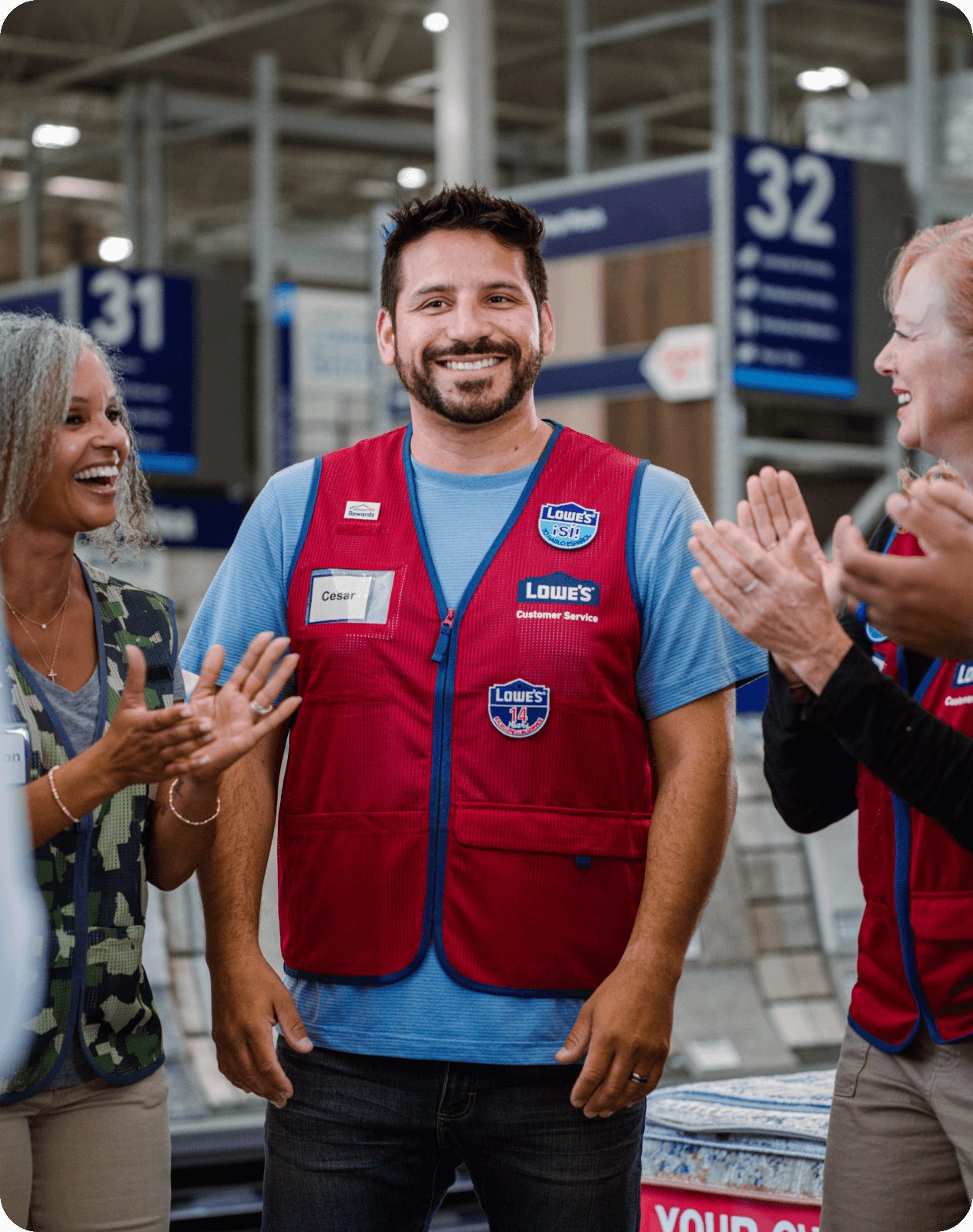 Store associates celebrating a team member's accomplishments