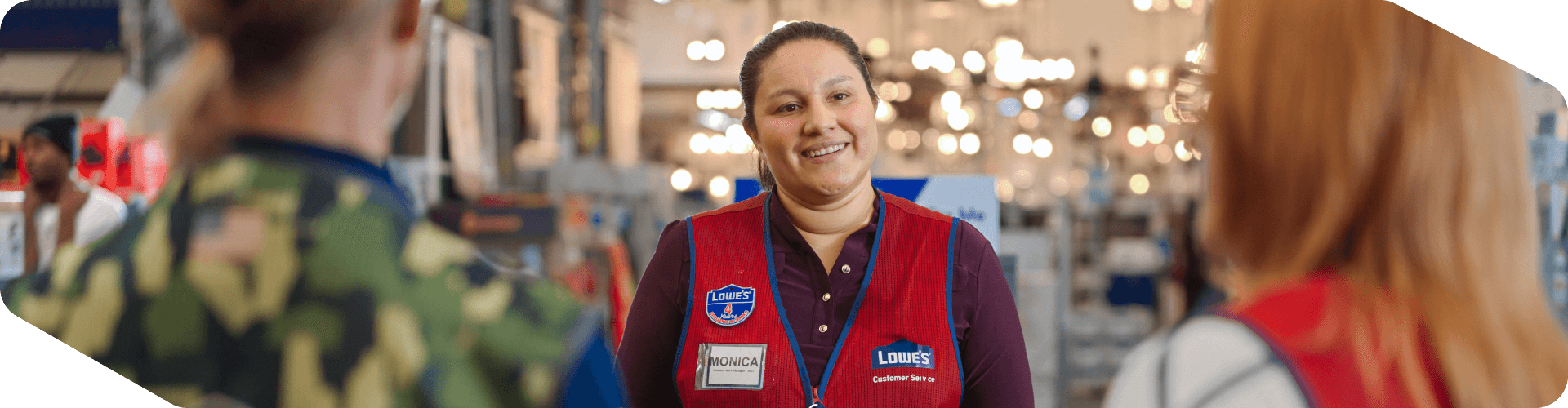 Lowe's Store Manager leading a team meeting