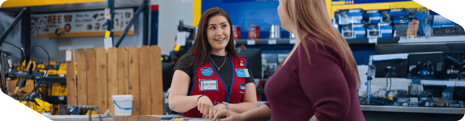 Lowe's Pro associate assisting a customer at the Pro desk