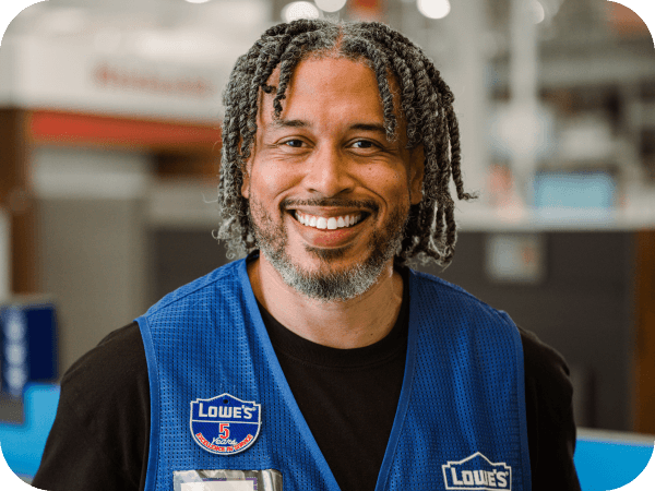 Lowe's MST associate smiling while working