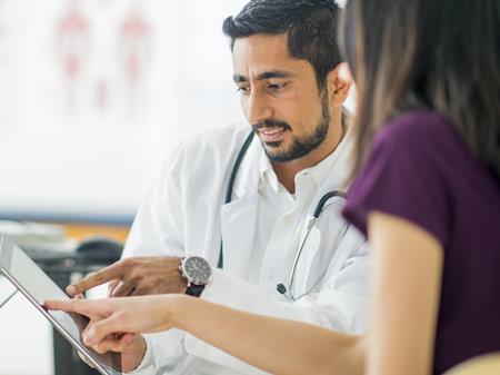 A doctor examining something