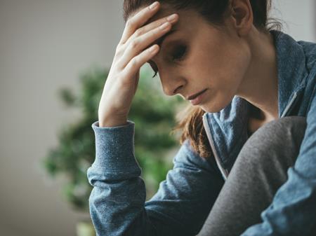 A woman sitting down