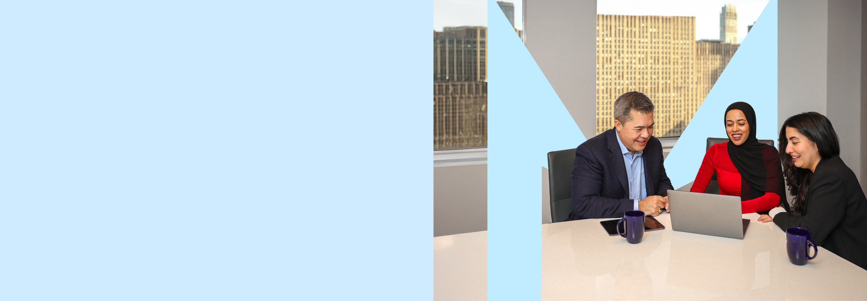 careers-nyc-our-culture-colleagues-with-laptop-hero-2880x1000