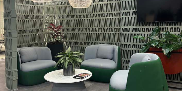 Johannesburg office lobby with three chairs and a coffee table