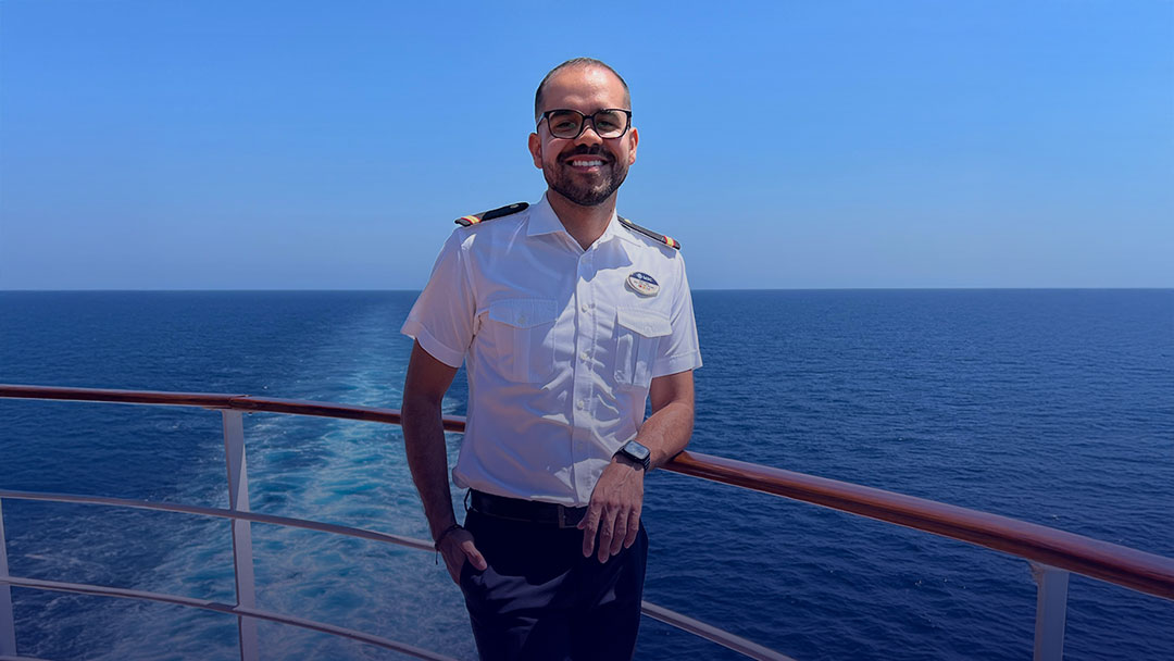Gustavo, Assistant Front Desk Manager at MSC Cruises, sharing career advice.
