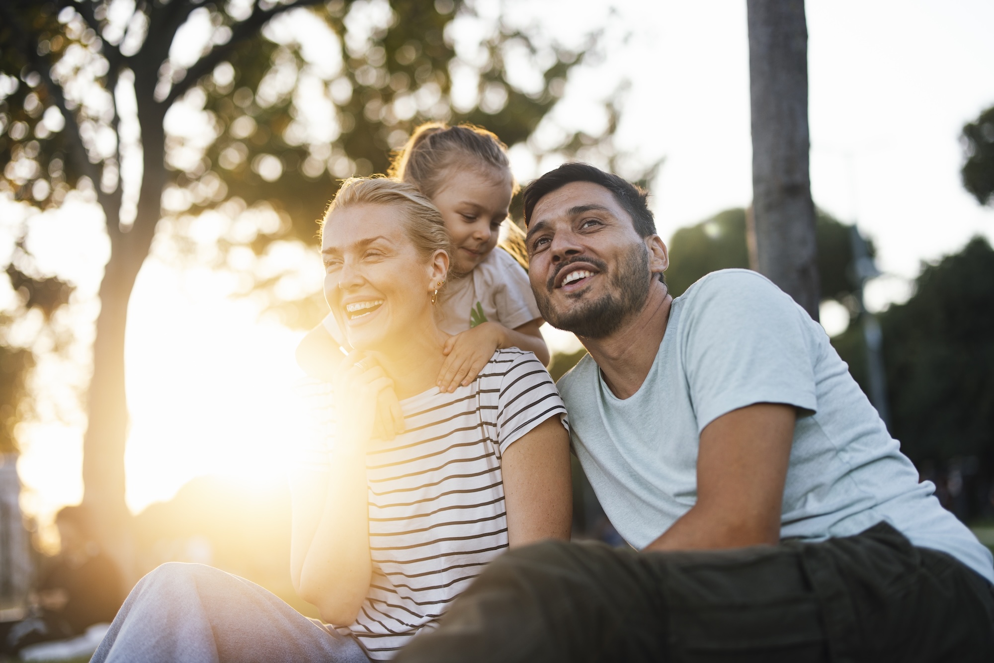 Family-of-three-having-fun-outdoors_HI