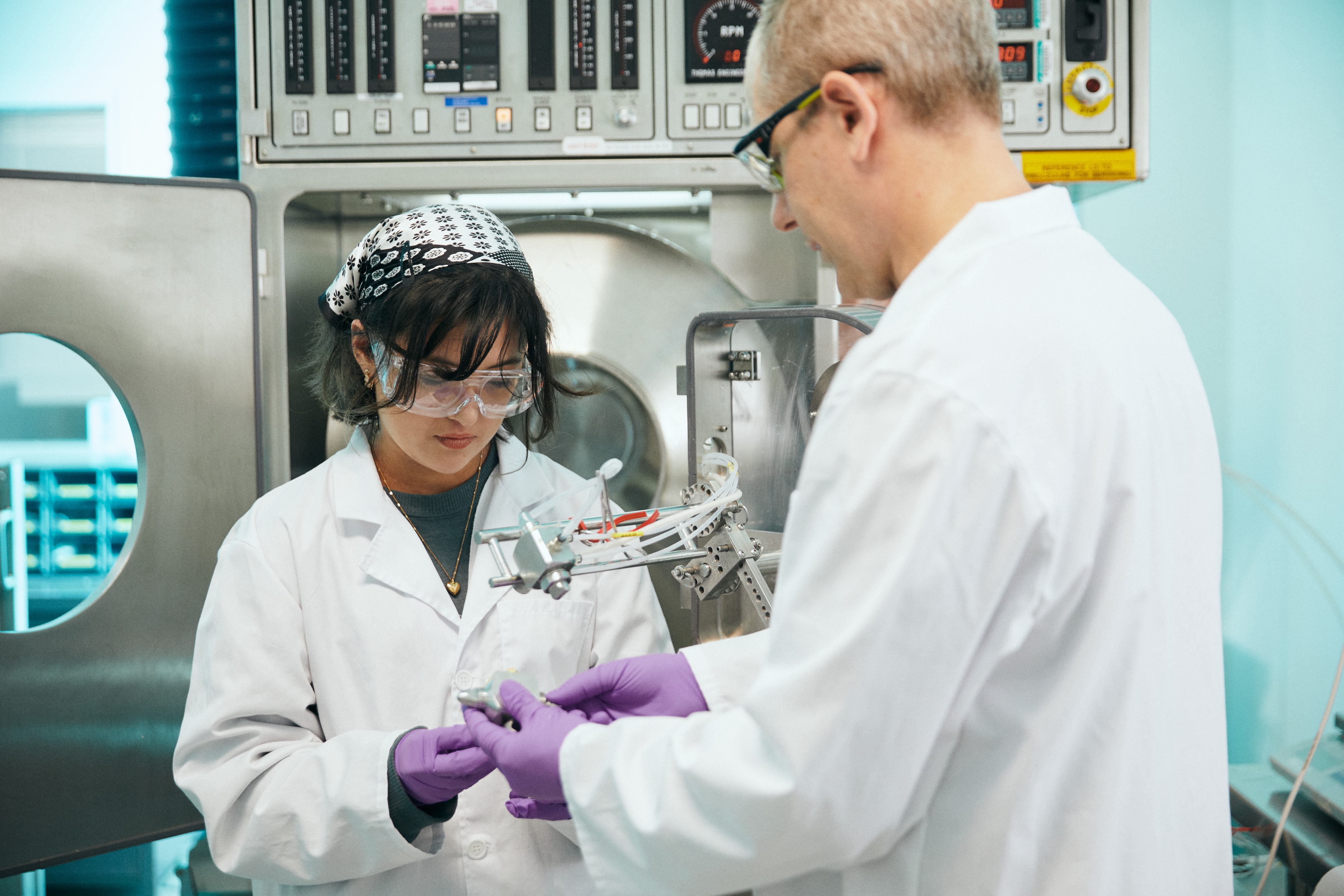 Scientists-working-on-film-coater_HI