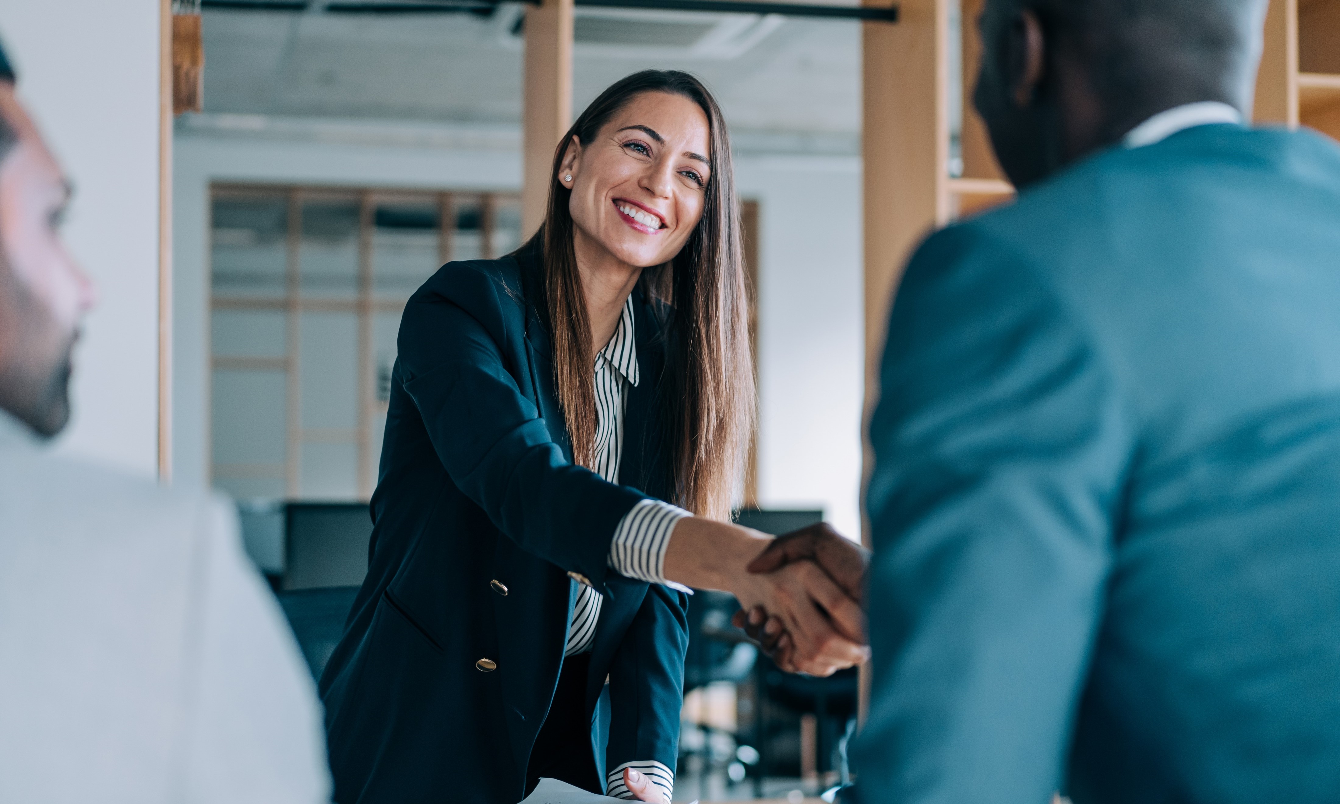 A person shaking hands with a person