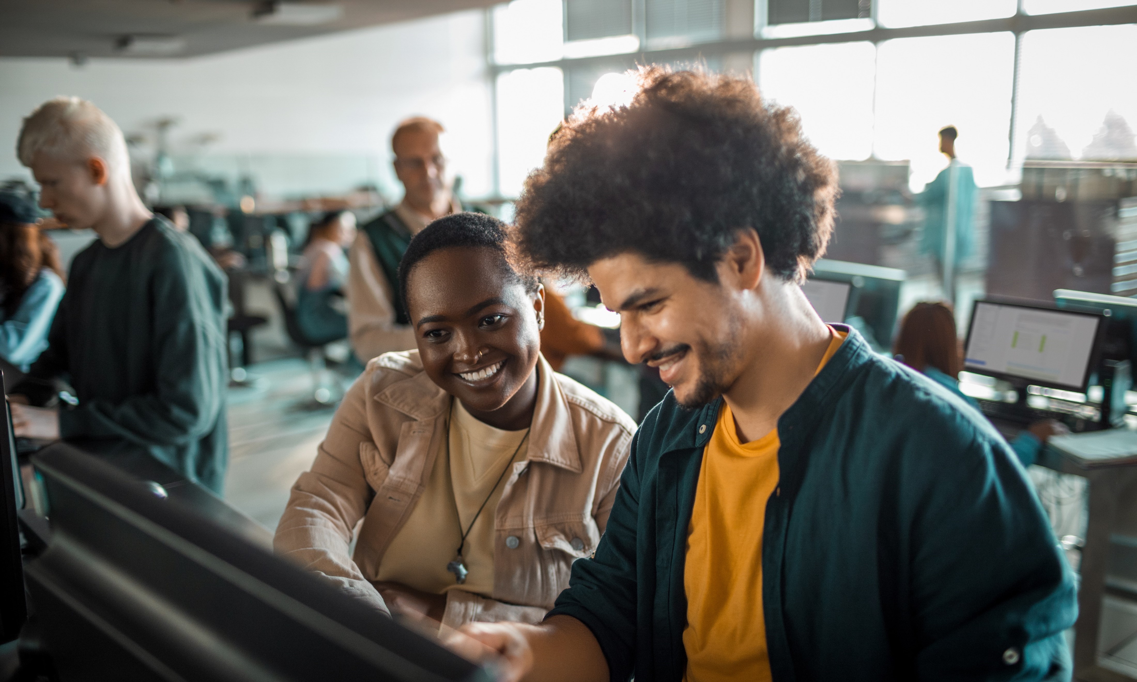 People working together at a computer