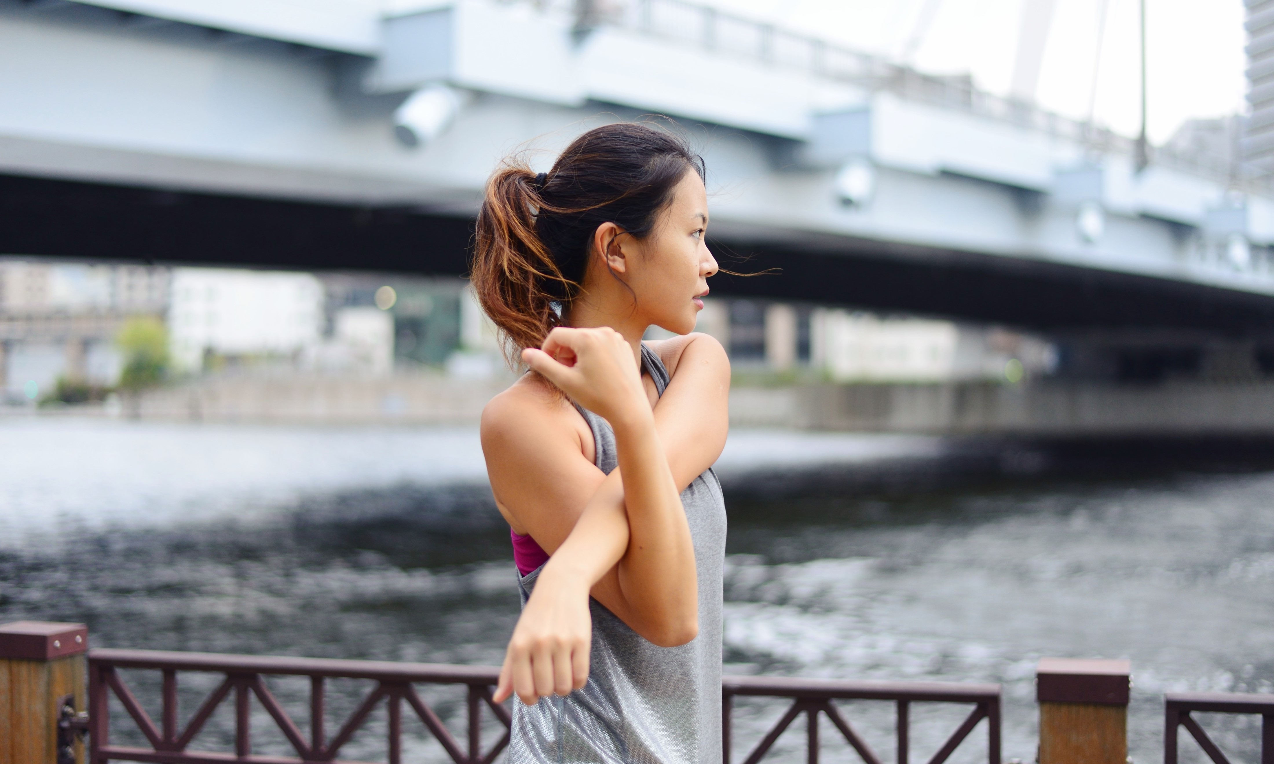 A women stretching outside