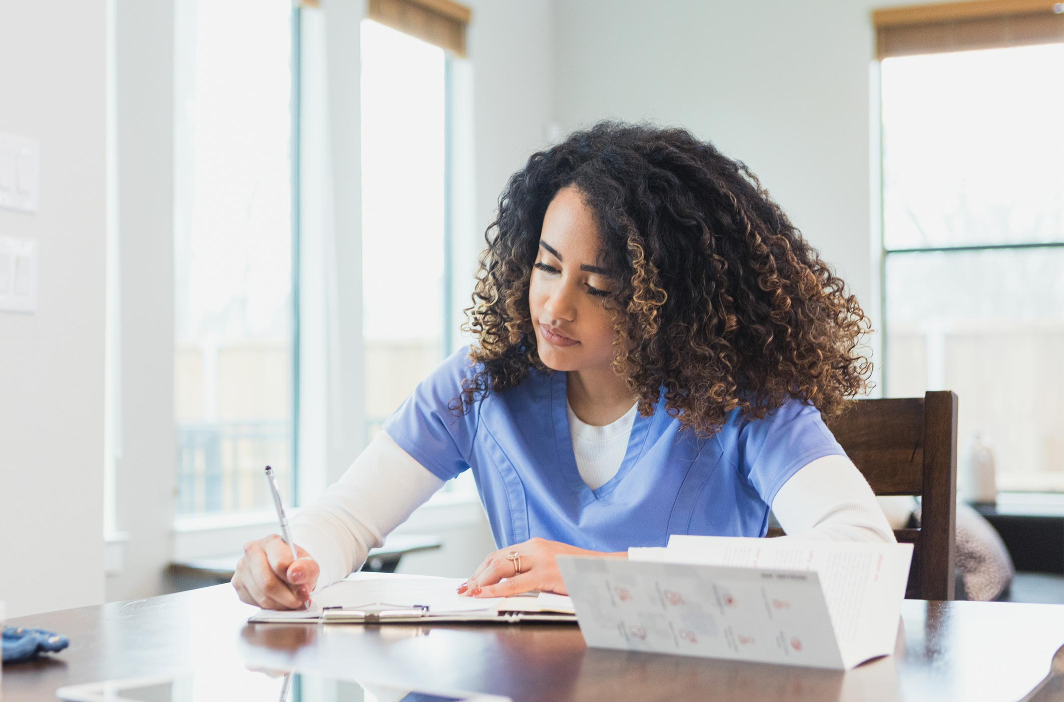 student nurse filling out an application