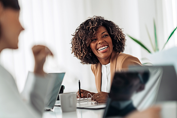 Our-employees_laughing-in-meeting_lo_96dpi