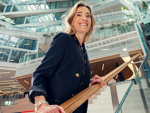 An Orange manager smiling