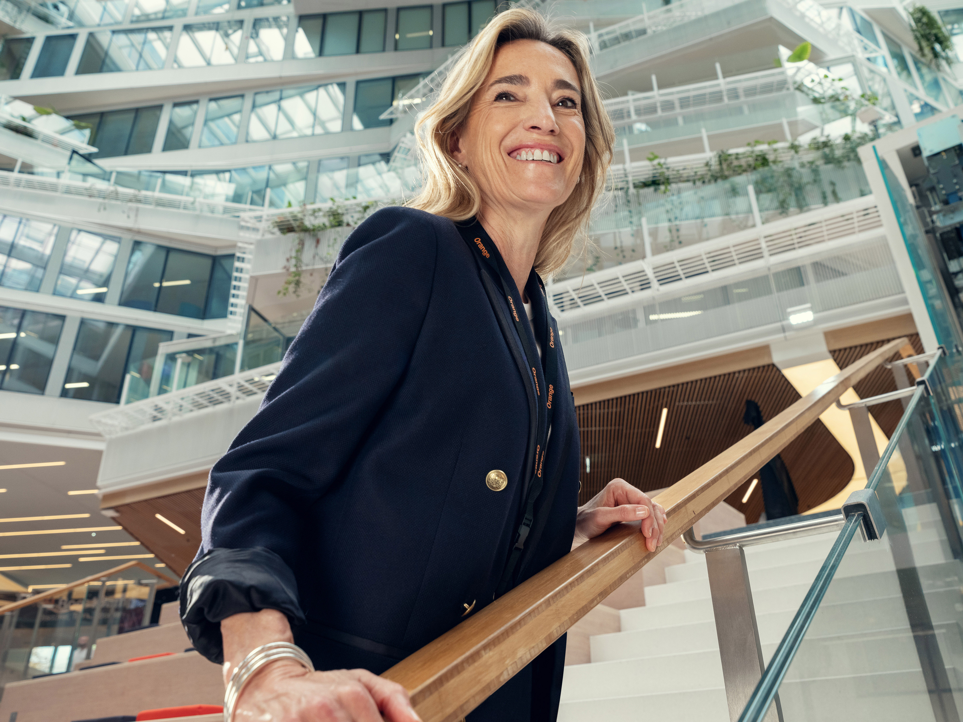 An Orange manager smiling