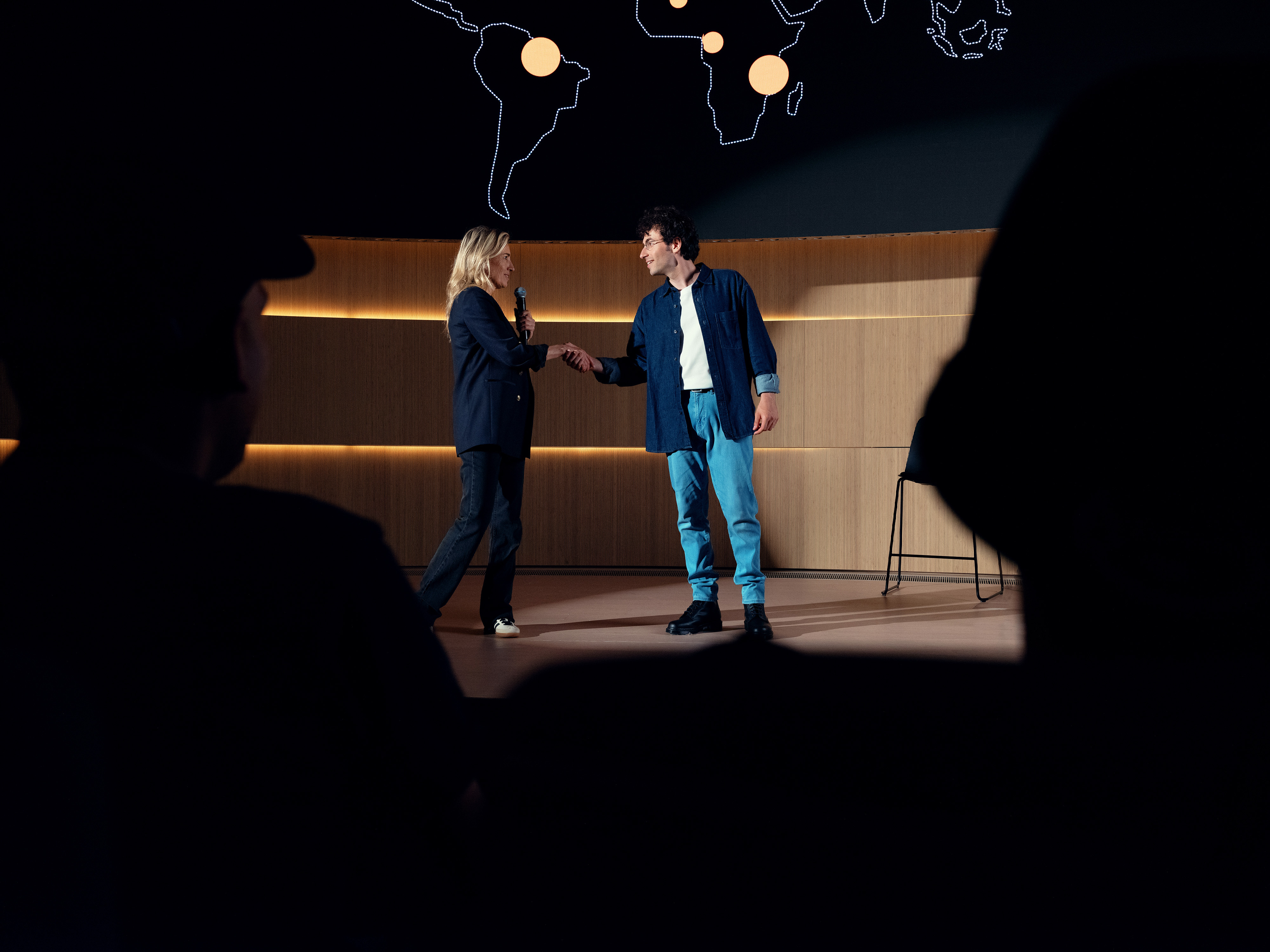 Two Orange colleagues at a conference