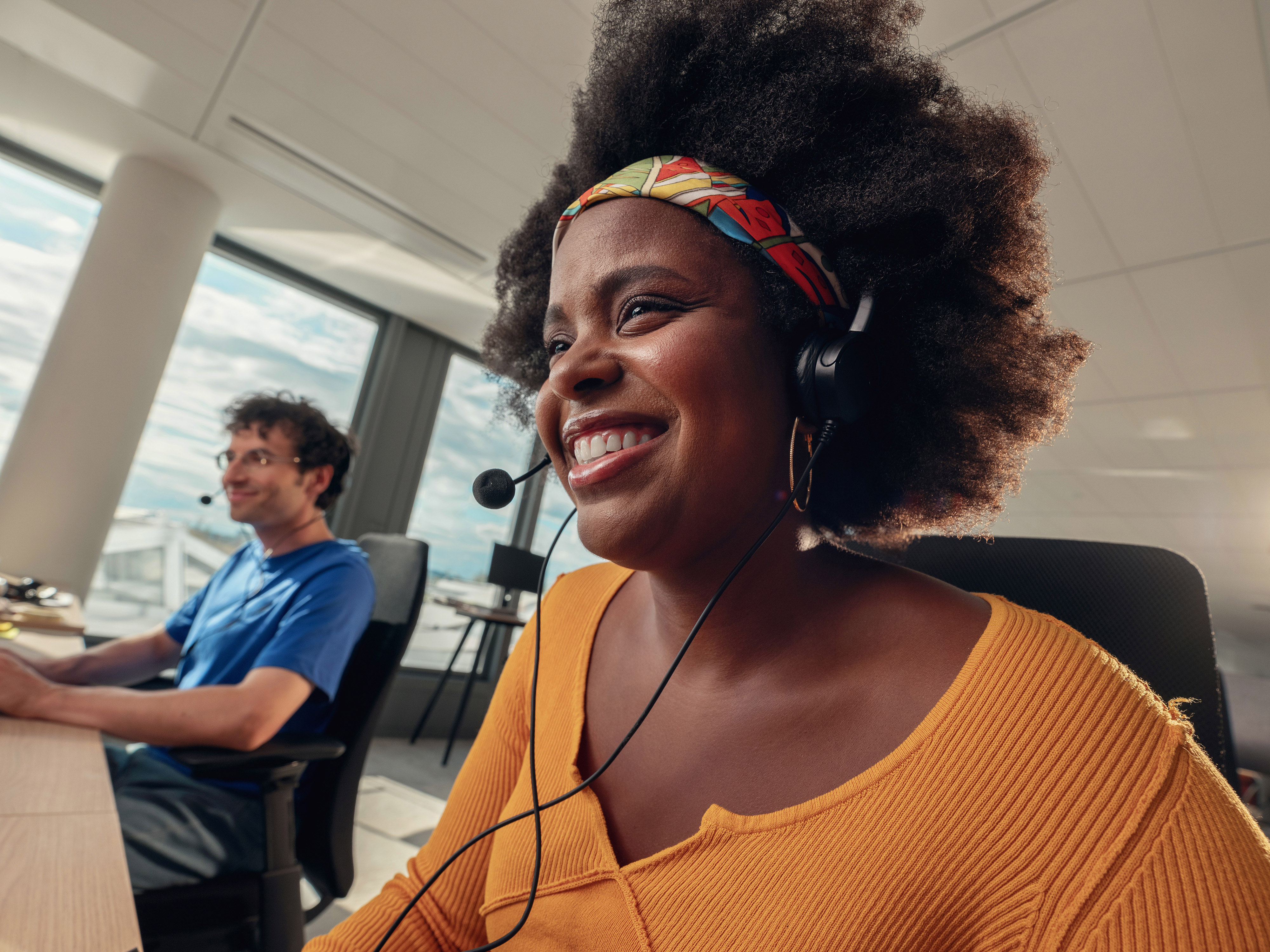 An Orange employee in a video conference