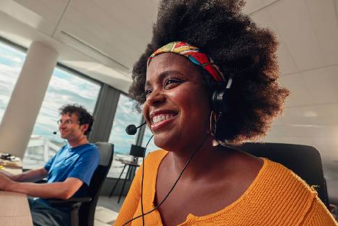 An Orange employee in a video conference