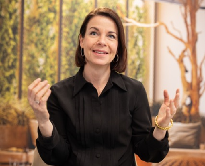 Orange corporate photo - meeting black dress