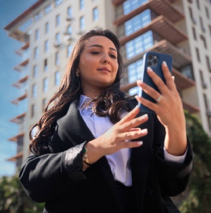 A woman using her smartphone