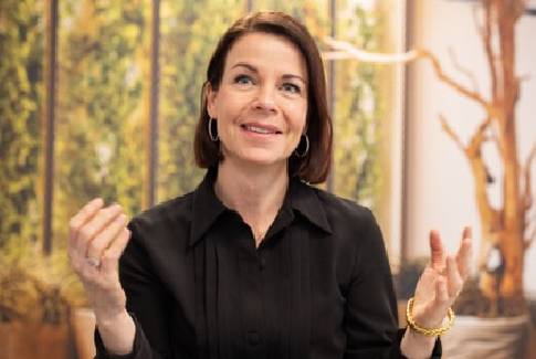 Orange corporate photo - meeting black dress