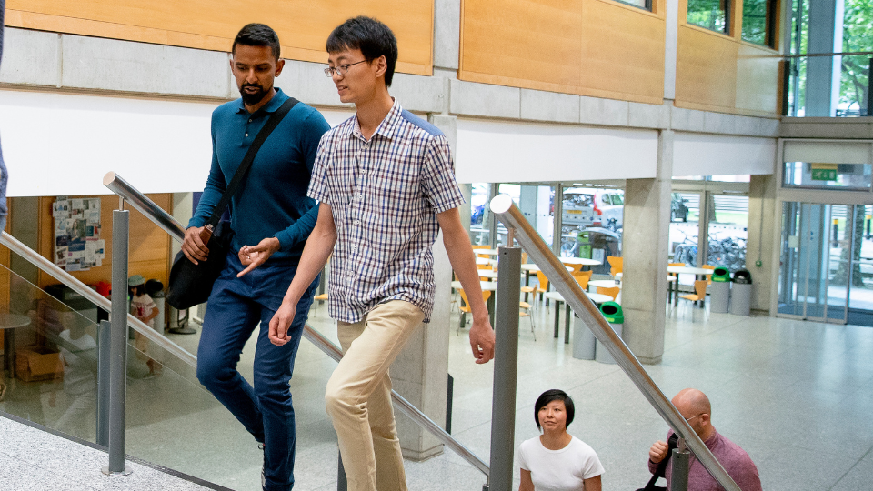 People walknig in school