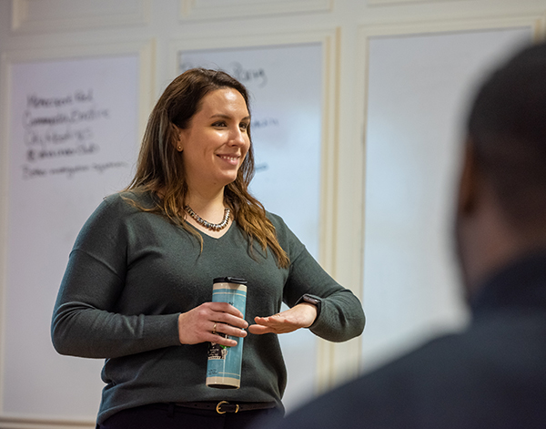 PNC employee teaching in classroom