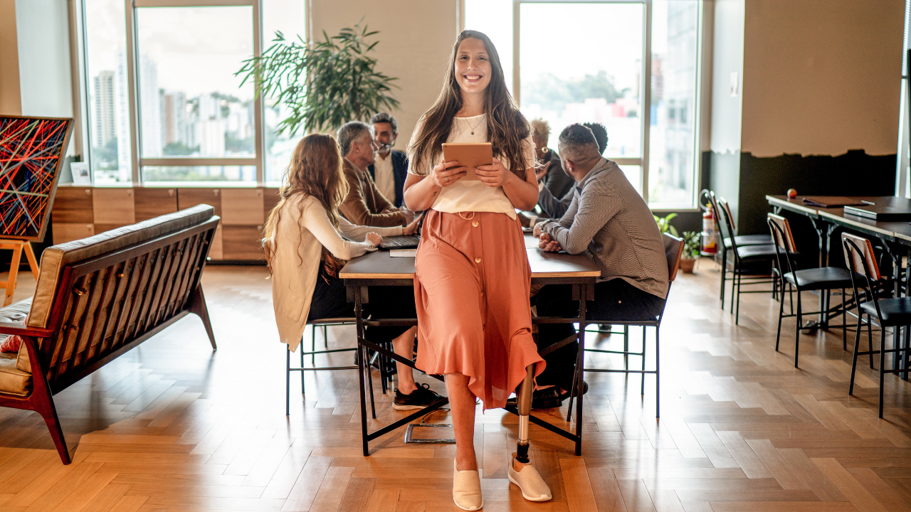 Girl standing in front of a table