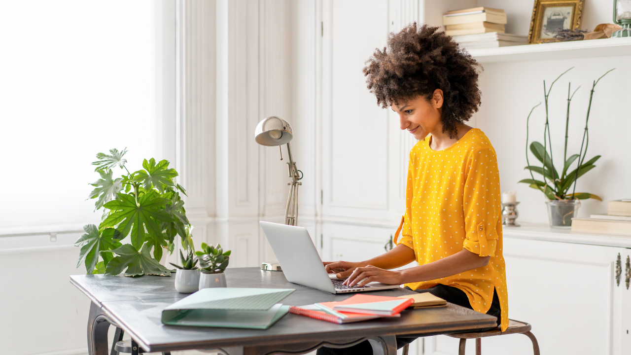 Girl sitting at a computer taking a digital interview