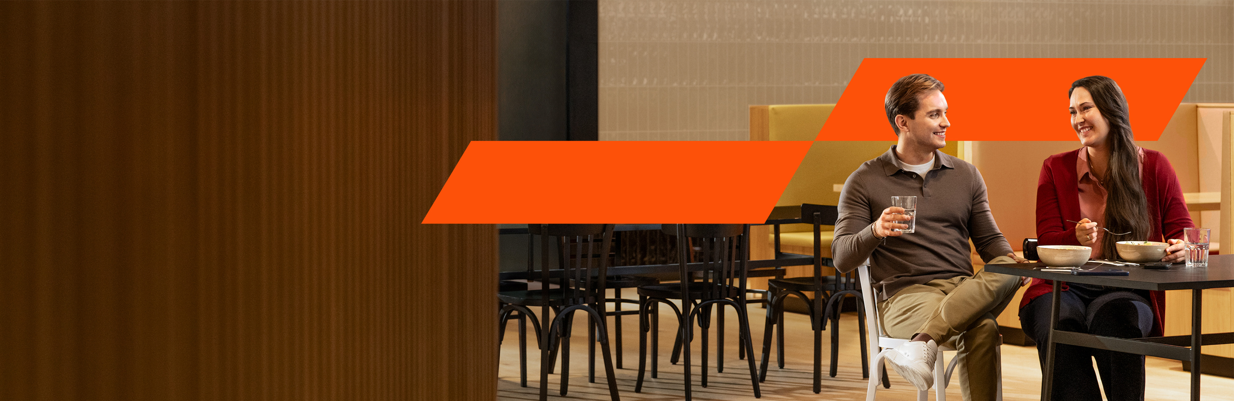 Colleagues sitting in the office at lunch