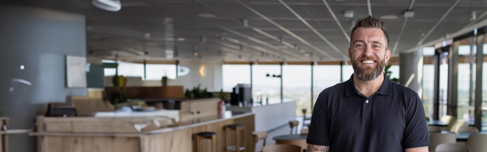 Bearded man in open office