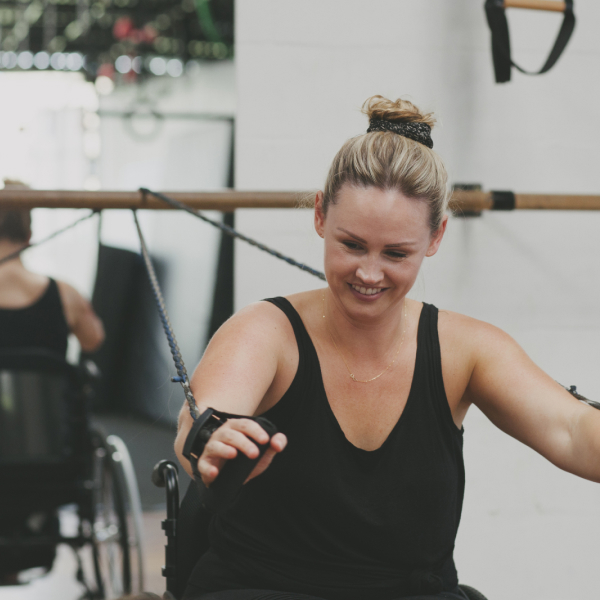 Lady in a wheelchair working out