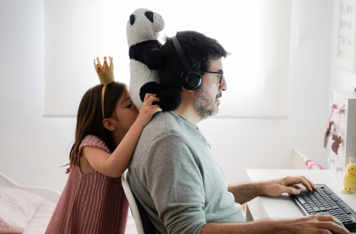 Man doing telework and reconciling family life