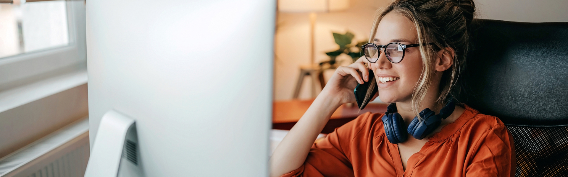 Young women working till late at home office