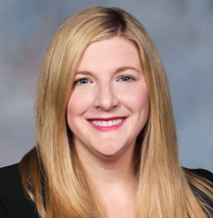 RiskDMTCaitlinBarreHeadshot